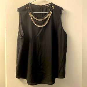 Karl Lagerfeld sleeveless black top with pearl and chain embellishments.